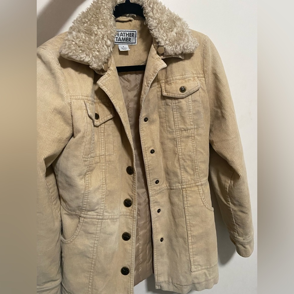 Tan corduroy trench coat with faux fur trimming.